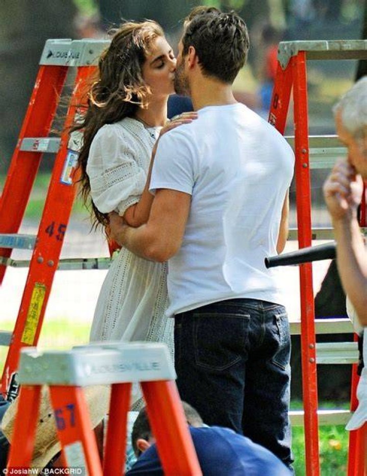 Taylor Hill sweetly kisses boyfriend Michael Stephen Shank during a